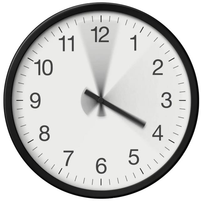 Industrial time wall clock with black frame and white face, the clock hands are moving so fast they are blurred.
